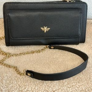 CROSSOVER PURSE. Black with gold bee and gold chain for handle.